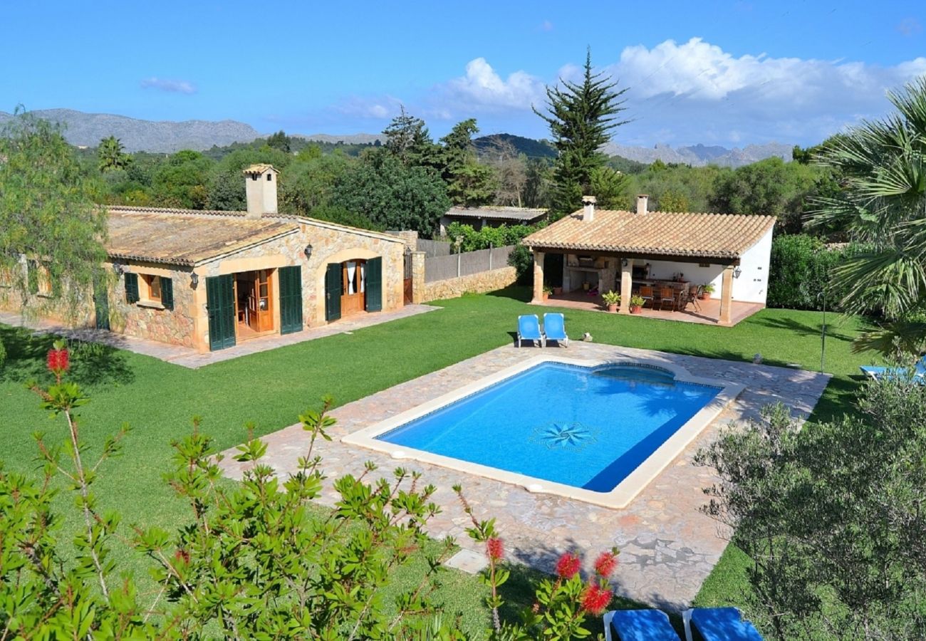 Aerial view of Finca Can Roig and its large pool in Mallorca